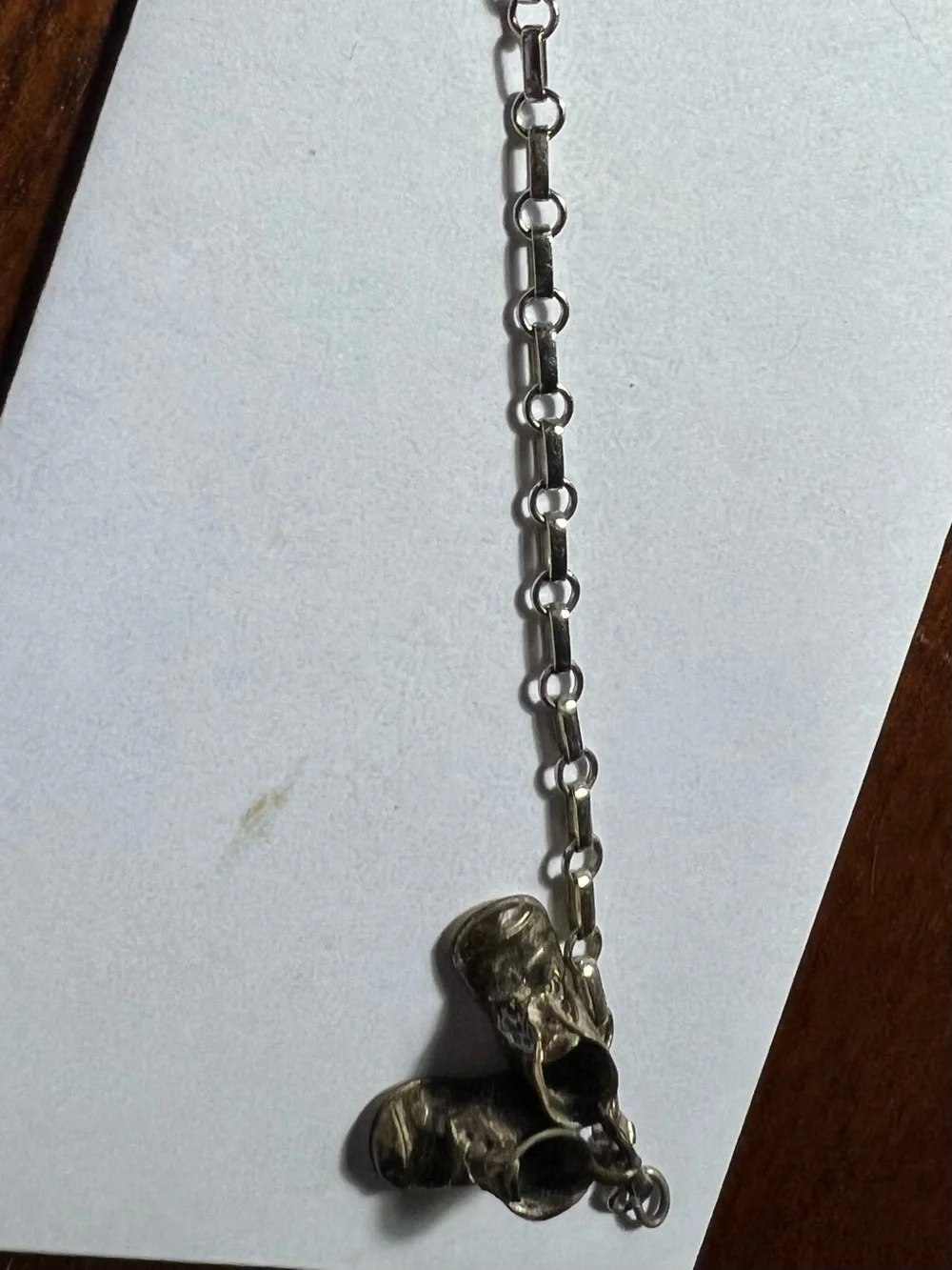 Sterling Silver charm bracelet with silver baby shoes charms